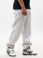 Pánské šedé tepláky Jigga Wear s nápisem Baggy Sweatpants