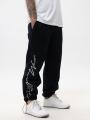 Spodnie Dresowe Baggy Męskie Czarne Jigga Wear Written Tag