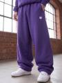 Spodnie Dresowe Baggy Męskie Fioletowe Jigga Wear Logo Drawcord