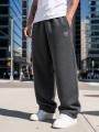 Spodnie Dresowe Baggy Męskie Ciemne Szare Jigga Wear Logo Drawcord