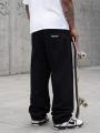 Szerokie Spodnie Jeansowe Baggy Męskie Czarne Metoda Sport Name