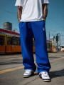 Spodnie Dresowe Baggy Męskie Niebieskie / Białe Jigga Wear Haft Logo Drawcord
