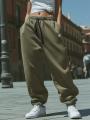 Spodnie Dresowe Baggy Damskie Khaki Jigga Wear Haft Logo Drawcord