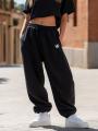 Spodnie Dresowe Baggy Damskie Czarne Jigga Wear Logo Drawcord