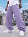 Spodnie Dresowe Baggy Męskie Ciemne Fioletowe Jigga Wear Logo Drawcord