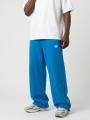 Spodnie Dresowe Baggy Męskie Niebieskie Jigga Wear Logo Drawcord
