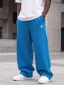 Spodnie Dresowe Baggy Męskie Niebieskie Jigga Wear Logo Drawcord