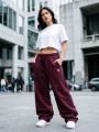 Spodnie Dresowe Baggy Damskie Śliwkowe Jigga Wear Haft Logo Drawcord